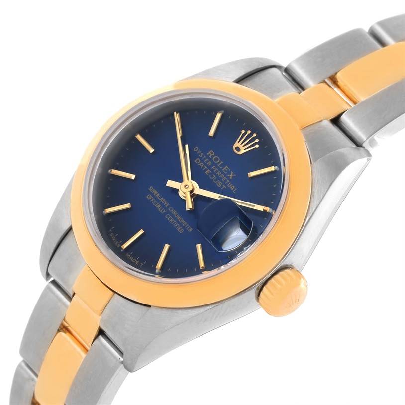 The image shows a Rolex Datejust 79163 Women's Steel and Gold (two tone) Blue Dial 79163 Women's Steel and Gold (two tone) Blue Dial model watch at an angle emphasizing the face, crown, and part of the two-tone bracelet.