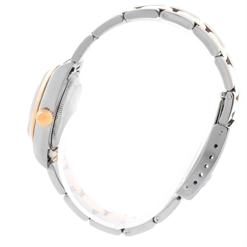 The image shows a side view of the Rolex Datejust 79163 Women's Steel and Gold (two tone) Blue Dial 79163 Women's Steel and Gold (two tone) Blue Dial watch, focusing on the crown, case, and bracelet.