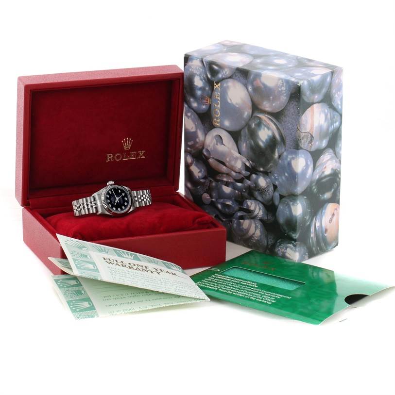 The image shows a Rolex Datejust 69174 Women's Stainless Steel Black Dial 69174 Women's Stainless Steel Black Dial watch in a red box with accompanying warranty card and outer packaging.