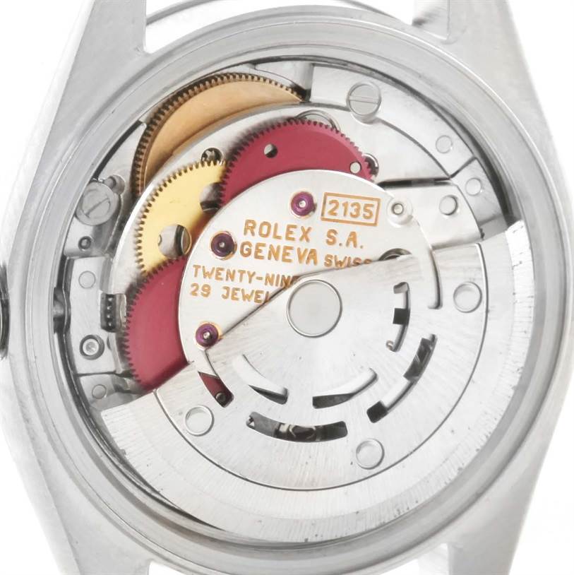 The image shows an angled view of the internal movement mechanism of a Rolex Datejust 69174 Women's Stainless Steel Black Dial 69174 Women's Stainless Steel Black Dial watch.