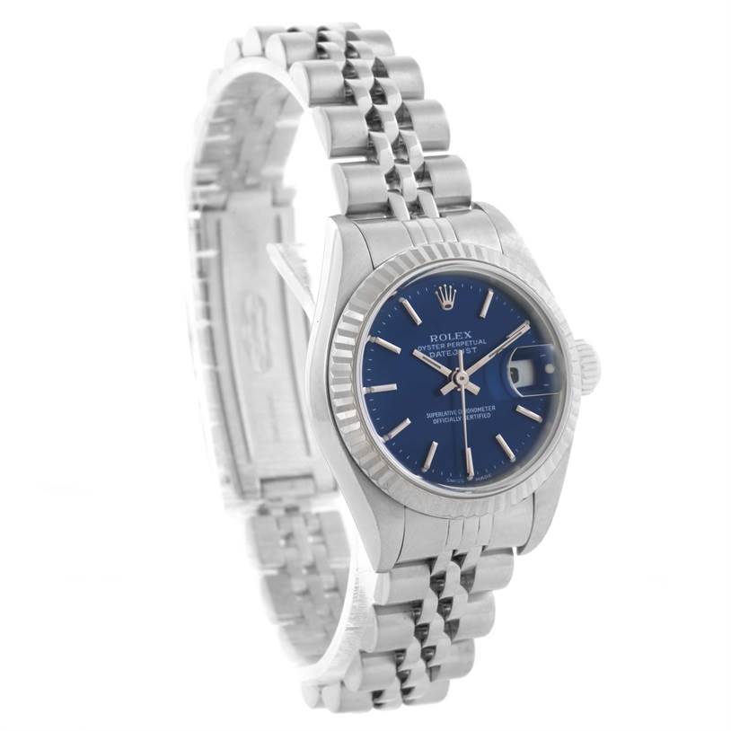 The image shows the Rolex Datejust 79174 Women's Stainless Steel Blue Dial 79174 Women's Stainless Steel Blue Dial watch from a side angle, displaying the face, bezel, crown, and bracelet.