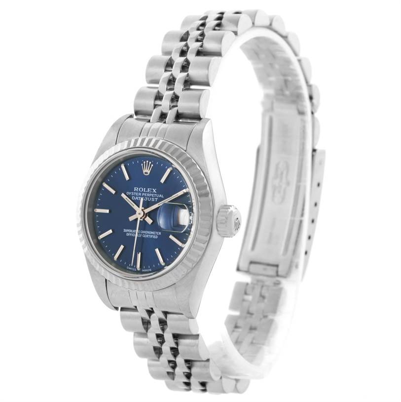 This image shows a Rolex Datejust 79174 Women's Stainless Steel Blue Dial 79174 Women's Stainless Steel Blue Dial watch at a three-quarter angle, featuring its blue dial, stainless steel case, and Jubilee bracelet.