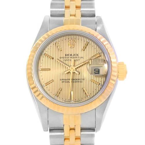 The image shows a frontal view of a Rolex Datejust 69173 Women's Stainless Steel Champagne Dial 69173 Women's Stainless Steel Champagne Dial watch, highlighting its gold dial, fluted bezel, and two-tone bracelet.