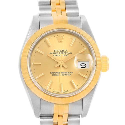 The image shows a front view of a Rolex Datejust 69173 Women's Stainless Steel Champagne Dial 69173 Women's Stainless Steel Champagne Dial watch with a gold dial, fluted bezel, cyclops date, and two-tone bracelet.