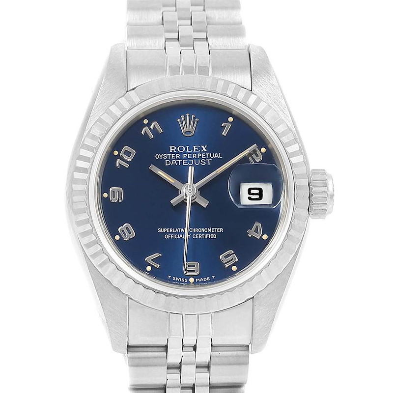 The image shows a top-down view of the Rolex Datejust 69174 Women's Stainless Steel Blue Dial 69174 Women's Stainless Steel Blue Dial watch, highlighting its blue dial, fluted bezel, and metal bracelet.