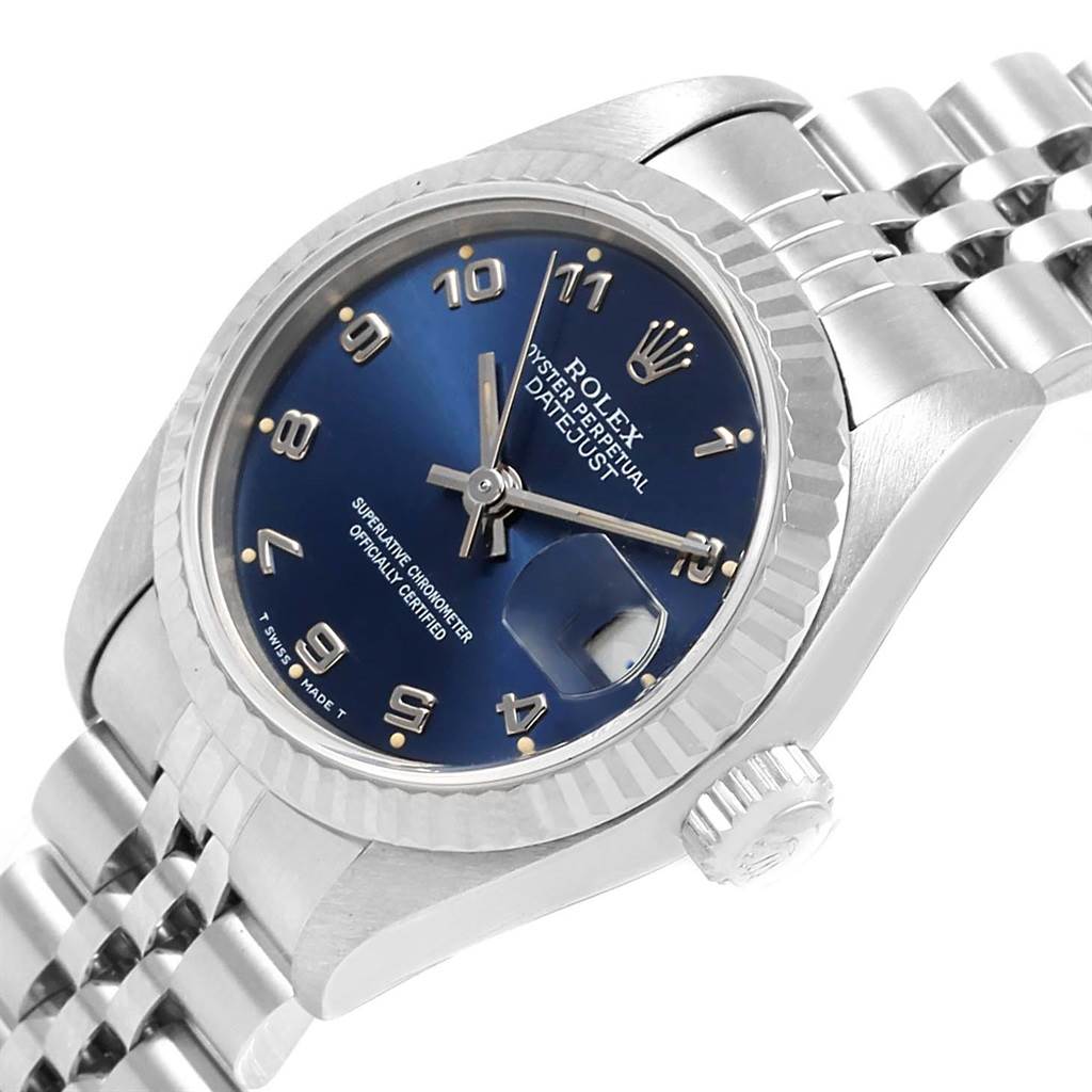 The Rolex Datejust 69174 Women's Stainless Steel Blue Dial 69174 Women's Stainless Steel Blue Dial watch is shown at an angle highlighting the blue dial, fluted bezel, and Jubilee bracelet.