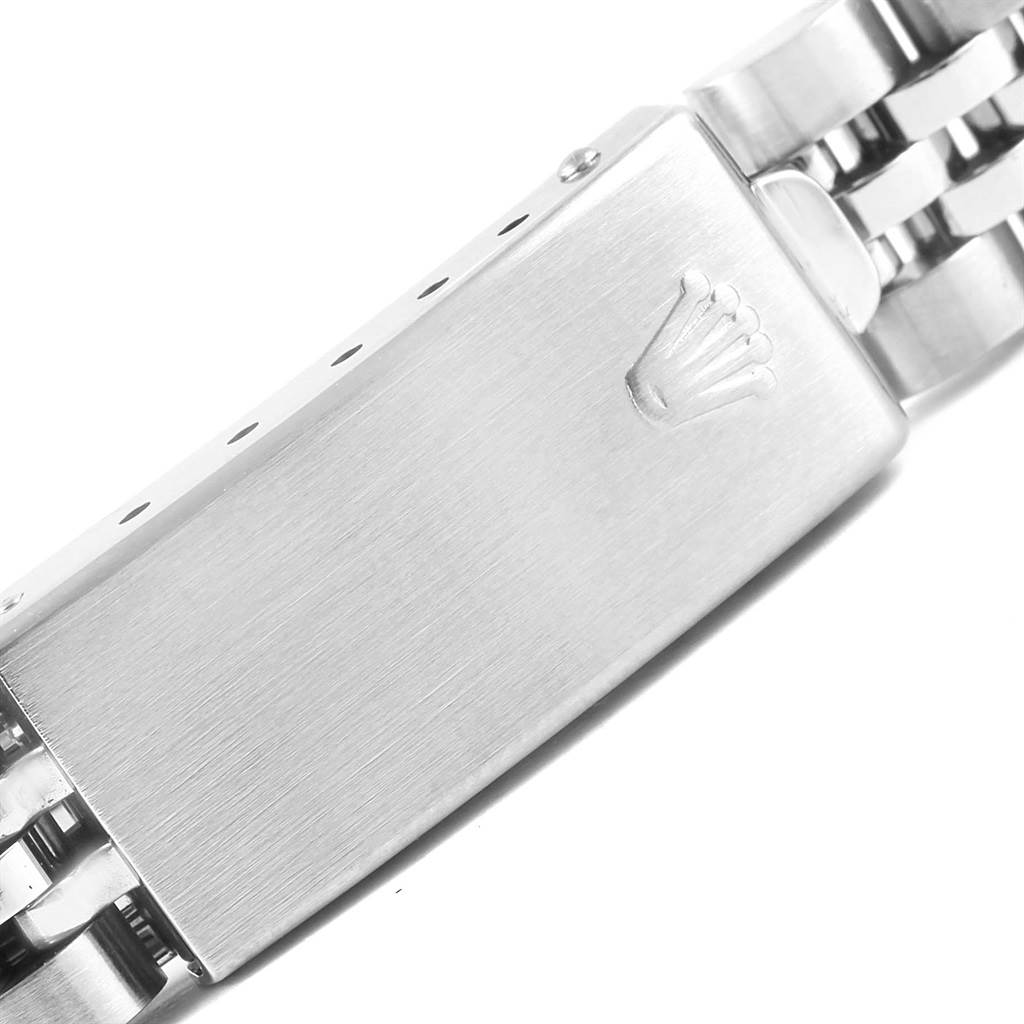 The image shows a close-up of the clasp and part of the bracelet of a Rolex Datejust 69174 Women's Stainless Steel Blue Dial 69174 Women's Stainless Steel Blue Dial watch.