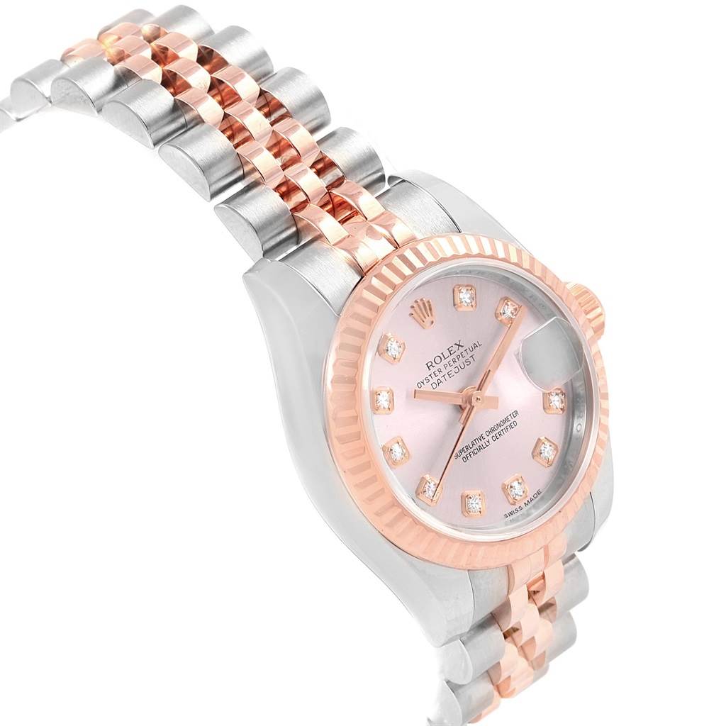 This image shows a side angle of a Rolex Datejust 179171 Women's Steel and Gold (two tone) Pink Dial 179171 Women's Steel and Gold (two tone) Pink Dial watch, highlighting its bracelet and pink dial with diamond markers.