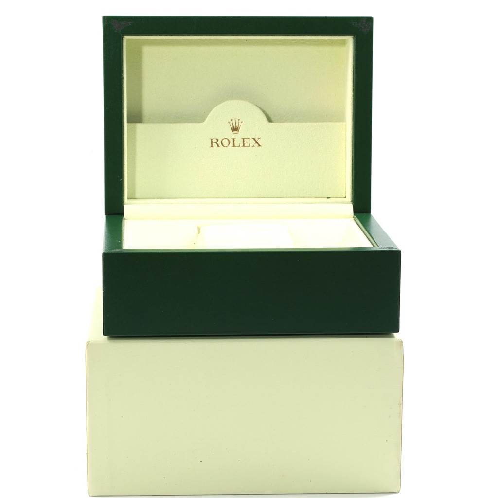 This image shows an open green and cream-colored Rolex Datejust 179171 Women's Steel and Gold (two tone) Pink Dial 179171 Women's Steel and Gold (two tone) Pink Dial watch box viewed from the front.