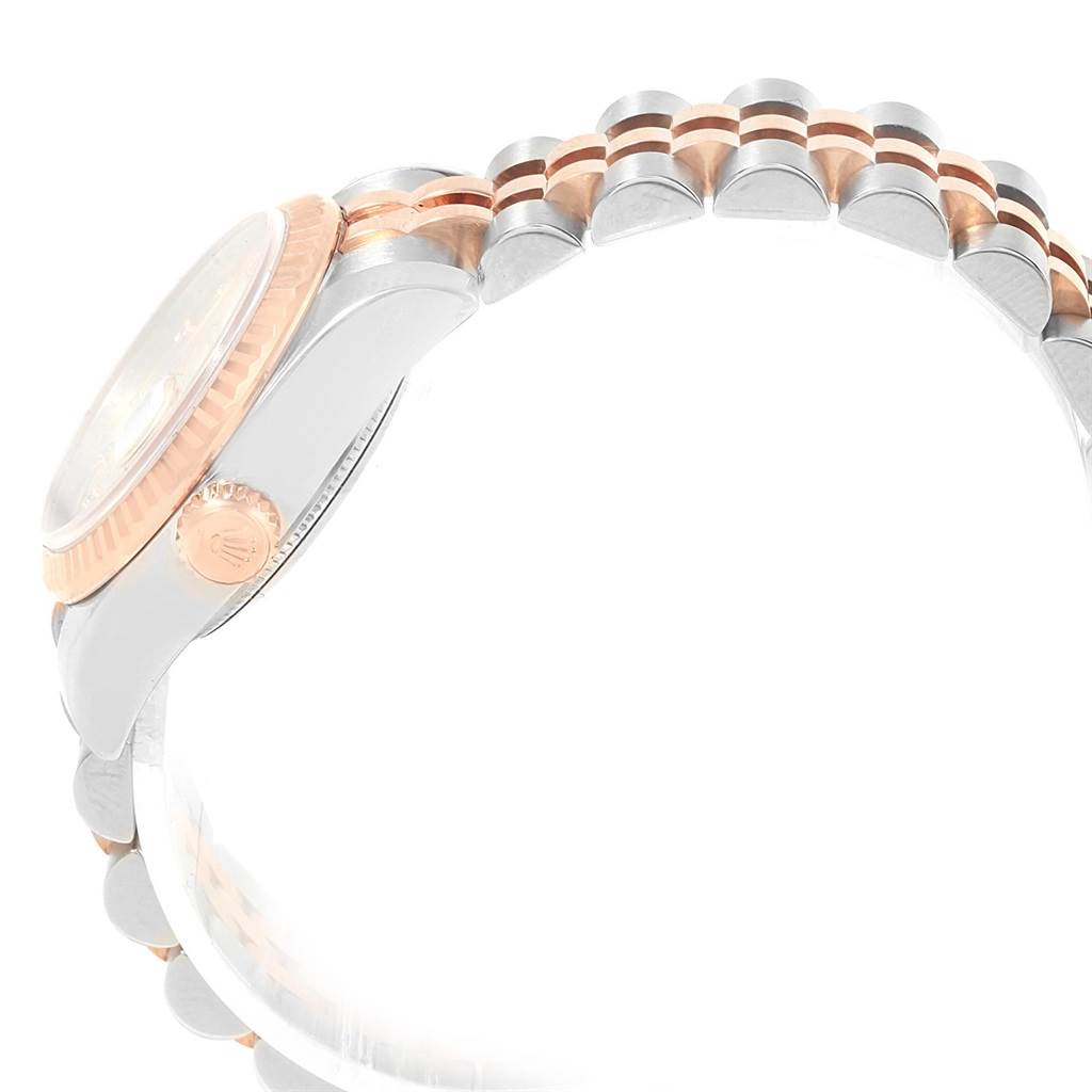 The image shows a side view of a Rolex Datejust 179171 Women's Steel and Gold (two tone) Pink Dial 179171 Women's Steel and Gold (two tone) Pink Dial watch focusing on the crown, case, and part of the bracelet.