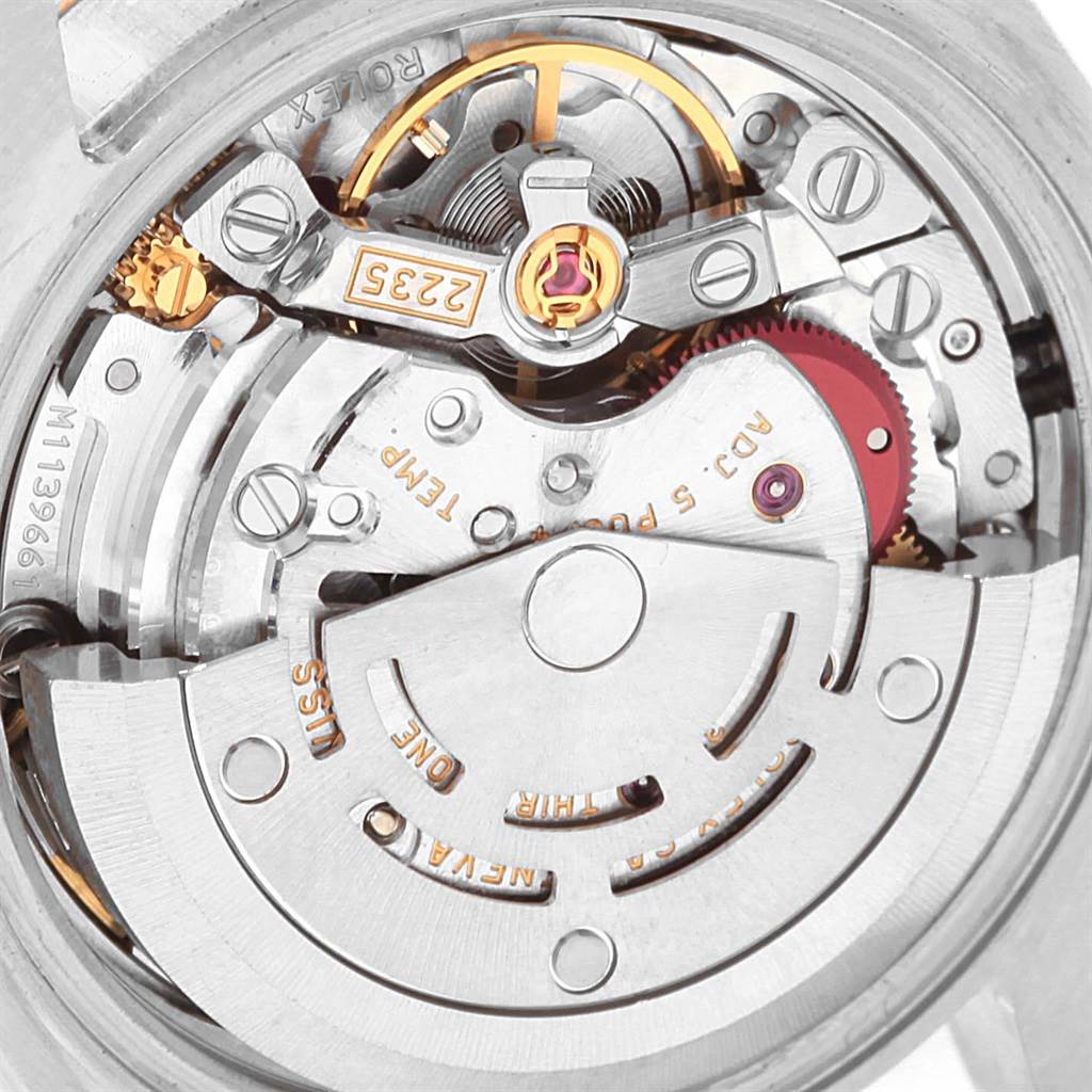 This image shows a close-up of the Rolex Datejust 179171 Women's Steel and Gold (two tone) Pink Dial 179171 Women's Steel and Gold (two tone) Pink Dial movement, showcasing its intricate internal components.