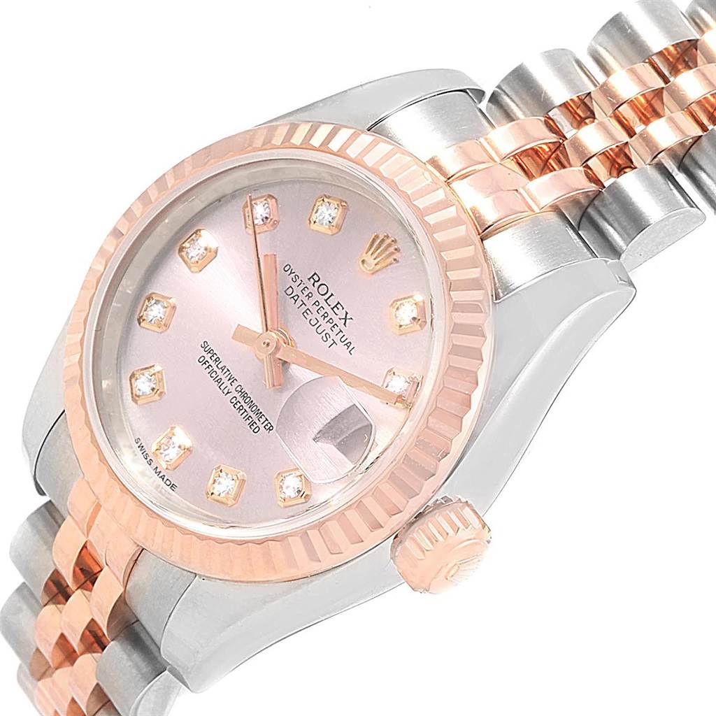 The image shows a close-up angled view of the dial, bezel, crown, and part of the bracelet of a Rolex Datejust 179171 Women's Steel and Gold (two tone) Pink Dial 179171 Women's Steel and Gold (two tone) Pink Dial watch.