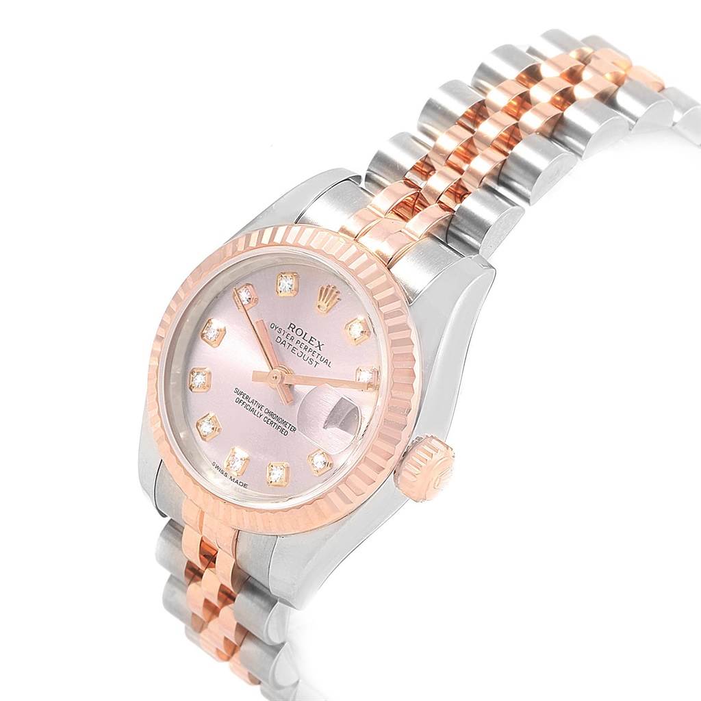The Rolex Datejust 179171 Women's Steel and Gold (two tone) Pink Dial 179171 Women's Steel and Gold (two tone) Pink Dial watch is shown at an angled view, displaying the face, bezel, and two-tone bracelet.