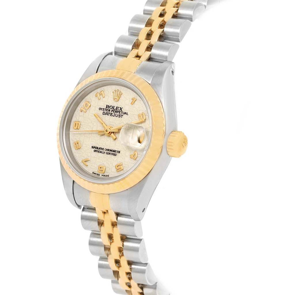 The Rolex Datejust 69173 Women's Stainless Steel Beige Dial 69173 Women's Stainless Steel Beige Dial watch is shown at an angle highlighting its dial, bezel, crown, and two-tone metal bracelet.