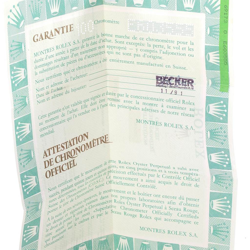 This image shows the warranty and certificate documents for a Rolex Datejust 69173 Women's Stainless Steel Beige Dial 69173 Women's Stainless Steel Beige Dial watch.