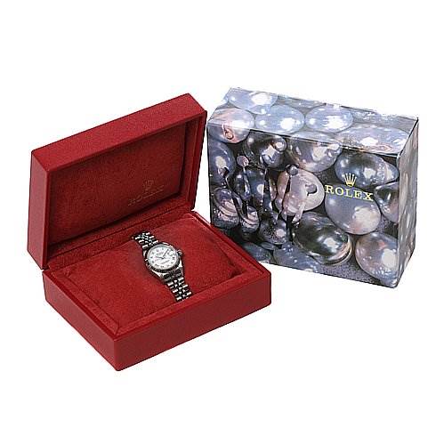 This image shows a Rolex Datejust 79174 Women's Stainless Steel White Dial 79174 Women's Stainless Steel White Dial watch displayed in a red box with an accompanying decorative outer box beside it.