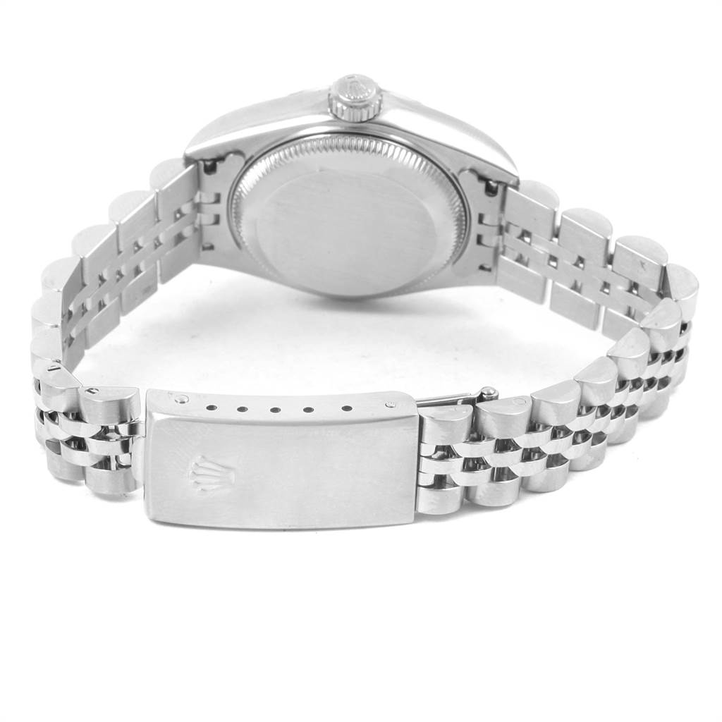 The image shows the back case, crown, and bracelet of a Rolex Datejust 79174 Women's Stainless Steel Silver Dial 79174 Women's Stainless Steel Silver Dial watch.