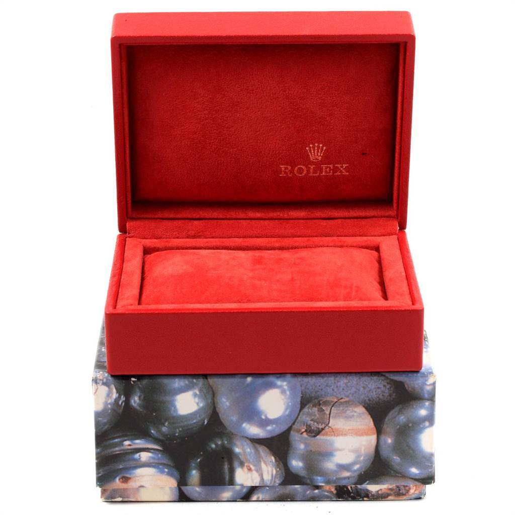 This image shows an open red velvet Rolex watch box for the Datejust model.