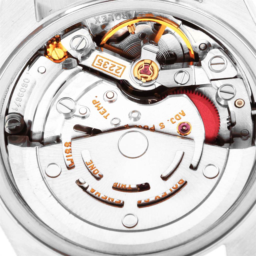 This image shows a close-up view of the internal movement mechanics of a Rolex Datejust 79174 Women's Stainless Steel Pink Dial 79174 Women's Stainless Steel Pink Dial watch.