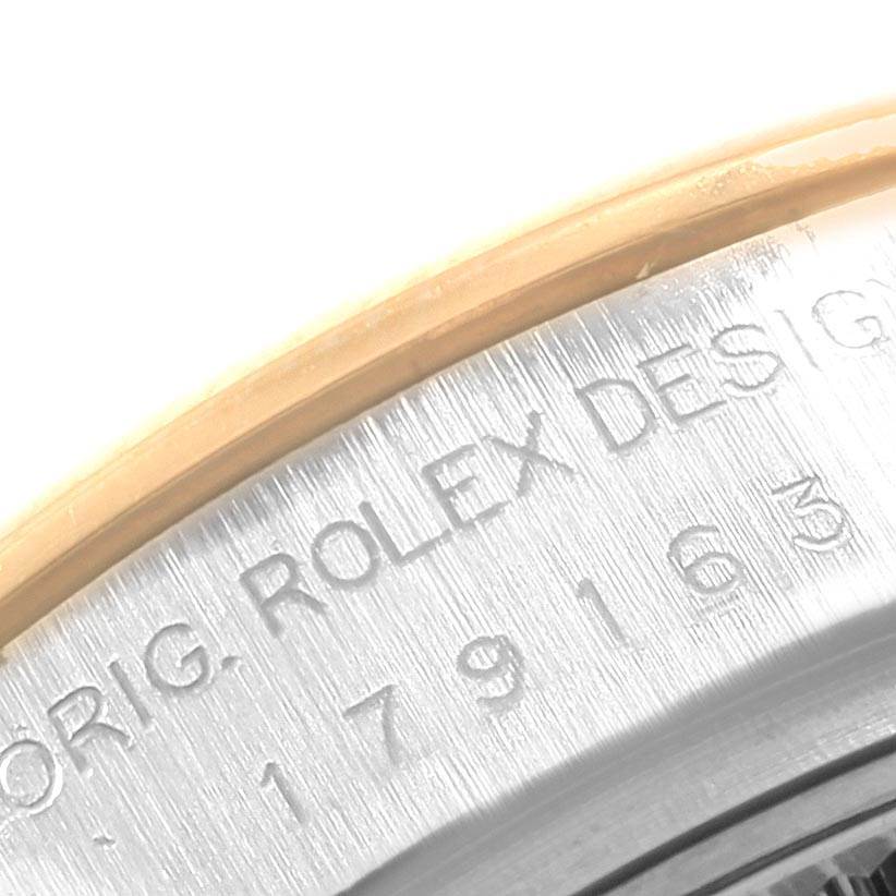 The image shows a close-up of the engraving on the side of the bezel of a Rolex Datejust 179163 Women's Steel and Gold (two tone) Champagne Dial 179163 Women's Steel and Gold (two tone) Champagne Dial watch.