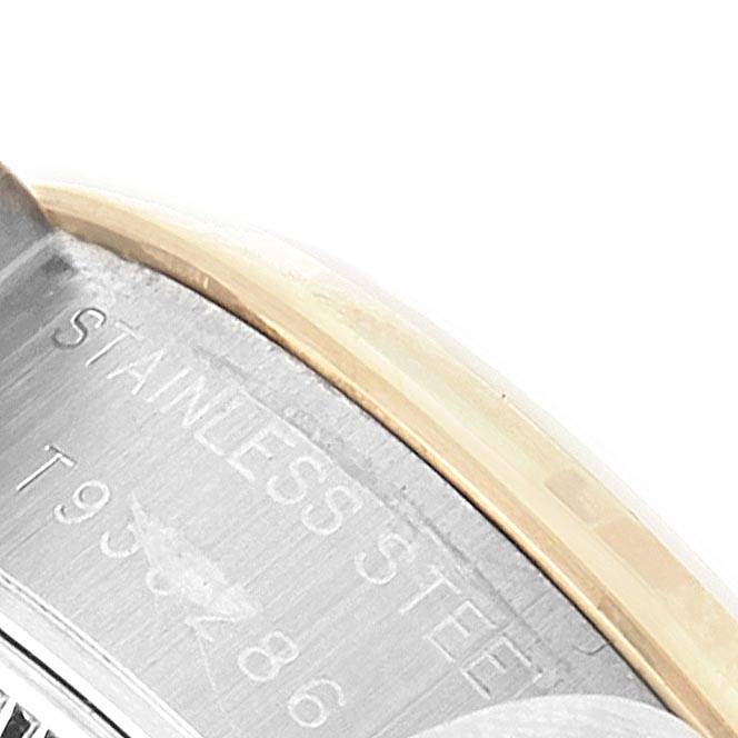 This image shows a close-up of the side of a Rolex Datejust 69163 Women's Steel and Gold (two tone) White Dial 69163 Women's Steel and Gold (two tone) White Dial, highlighting the stainless steel marking and partial serial number.