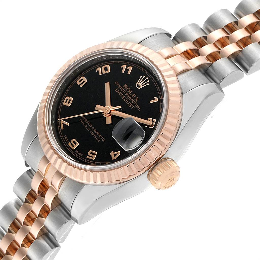 The Rolex Datejust 179171 Women's Steel and Gold (two tone) Black Dial 179171 Women's Steel and Gold (two tone) Black Dial watch is shown at an angle highlighting the face, bezel, and part of the bracelet.