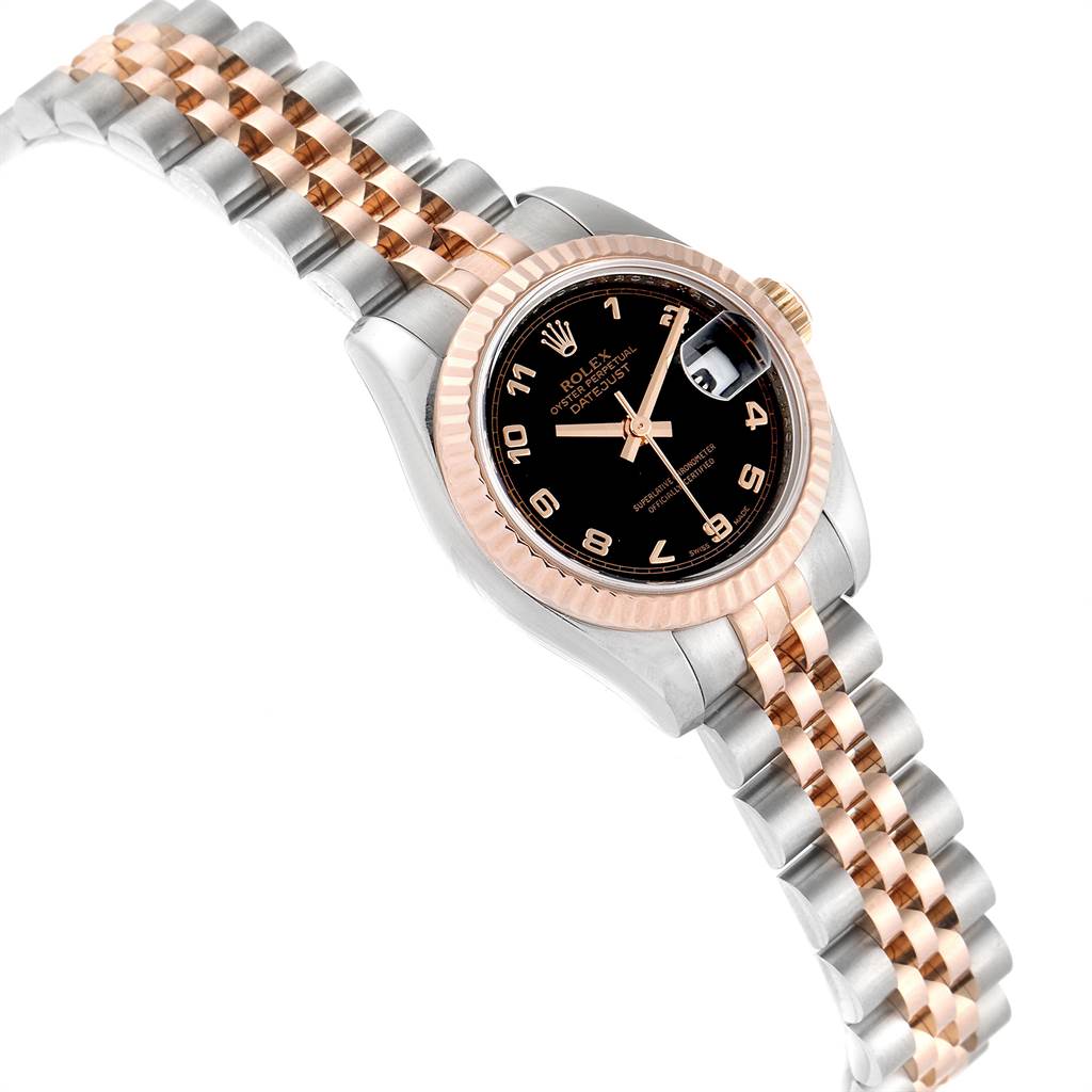 This image shows an angled view of a Rolex Datejust 179171 Women's Steel and Gold (two tone) Black Dial 179171 Women's Steel and Gold (two tone) Black Dial watch, highlighting its black dial, two-tone metal bezel, and Jubilee bracelet.
