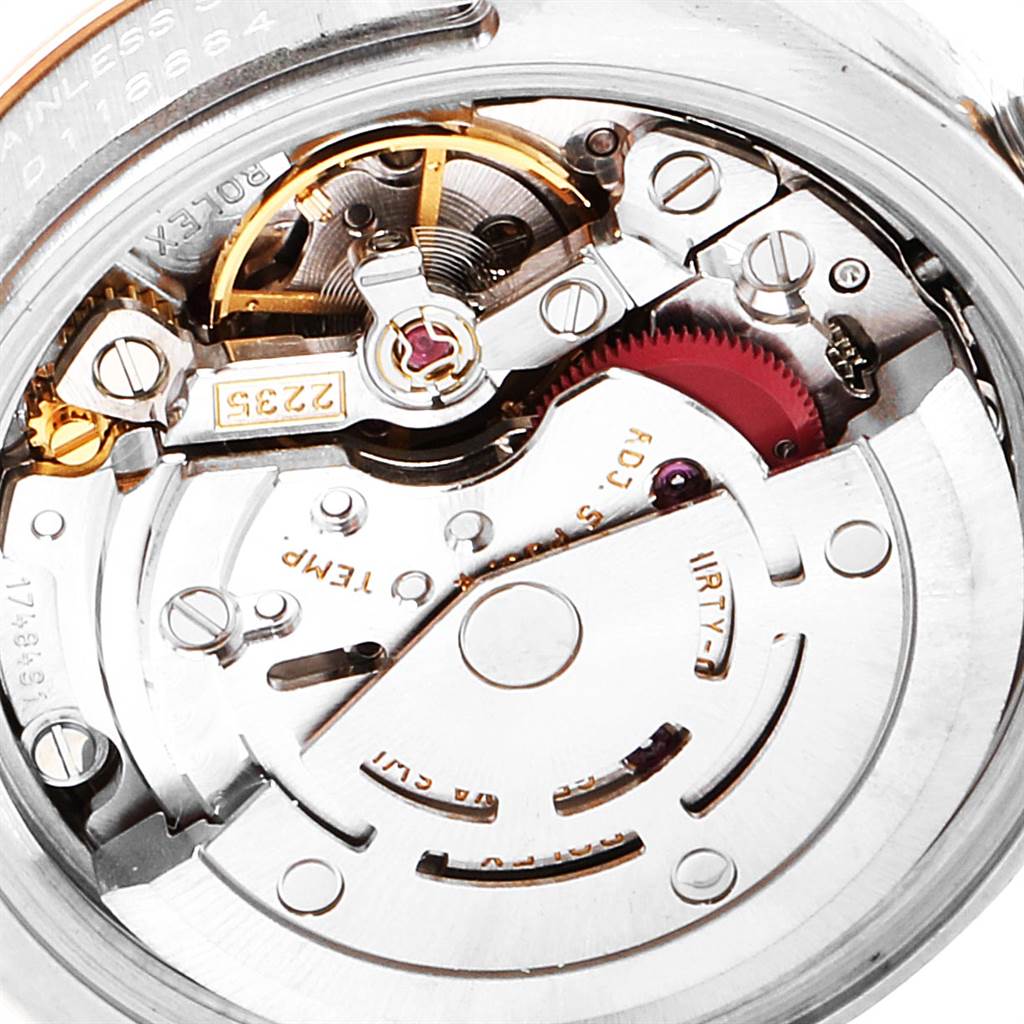 This close-up image shows the intricate internal mechanism of the Rolex Datejust 179171 Women's Steel and Gold (two tone) Black Dial 179171 Women's Steel and Gold (two tone) Black Dial watch's movement.