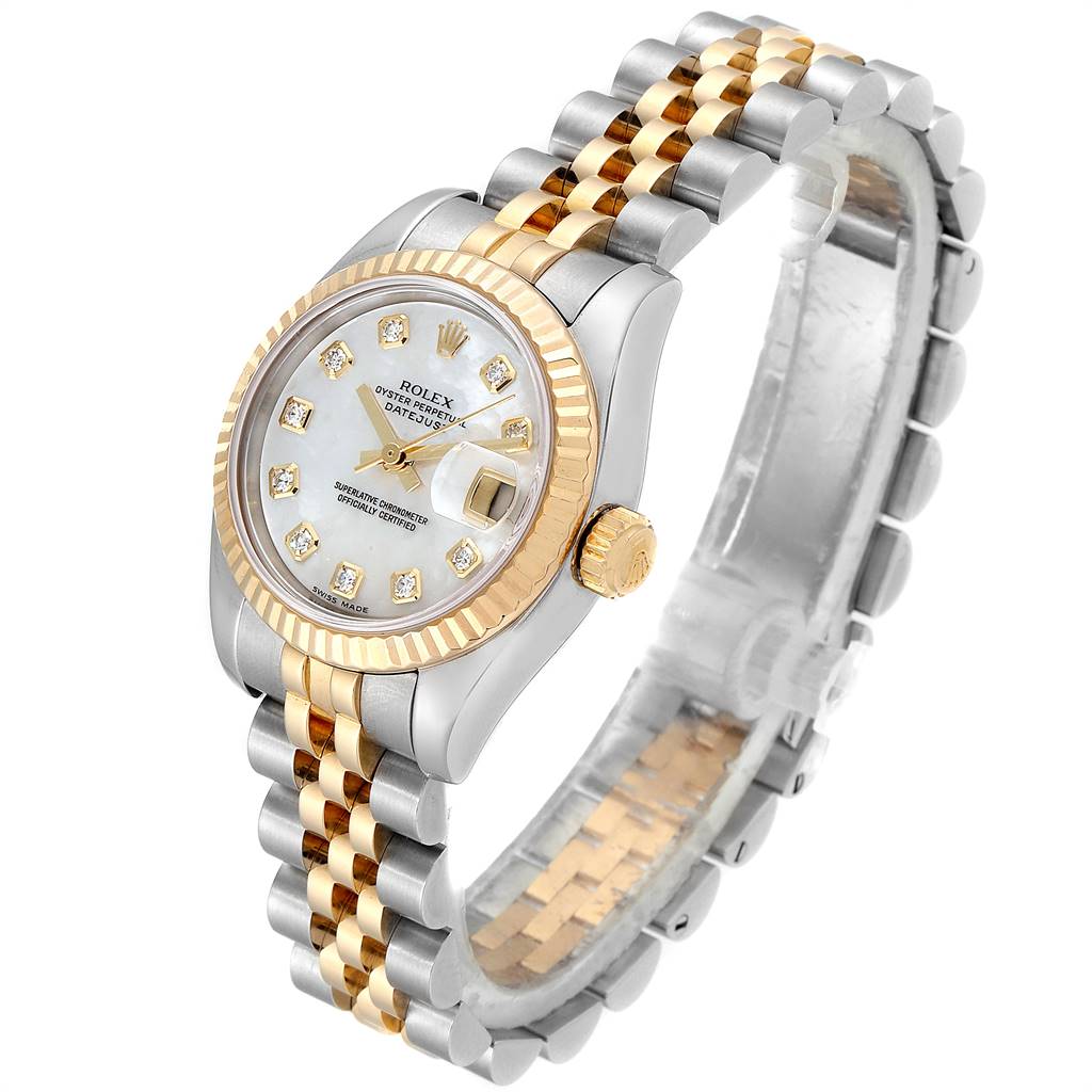 The Rolex Datejust 179173 Women's Steel and Gold (two tone) Mother of Pearl Dial 179173 Women's Steel and Gold (two tone) Mother of Pearl Dial watch is shown at a three-quarter angle, highlighting its two-tone bracelet, fluted bezel, and diamond markers.