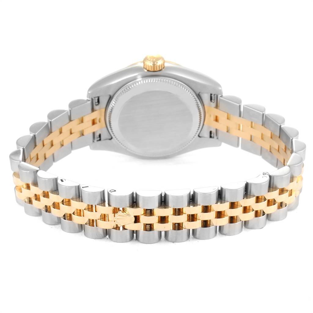 The image shows the back view and bracelet of a Rolex Datejust 179173 Women's Steel and Gold (two tone) Mother of Pearl Dial 179173 Women's Steel and Gold (two tone) Mother of Pearl Dial watch, highlighting the two-tone metal strap and case back.