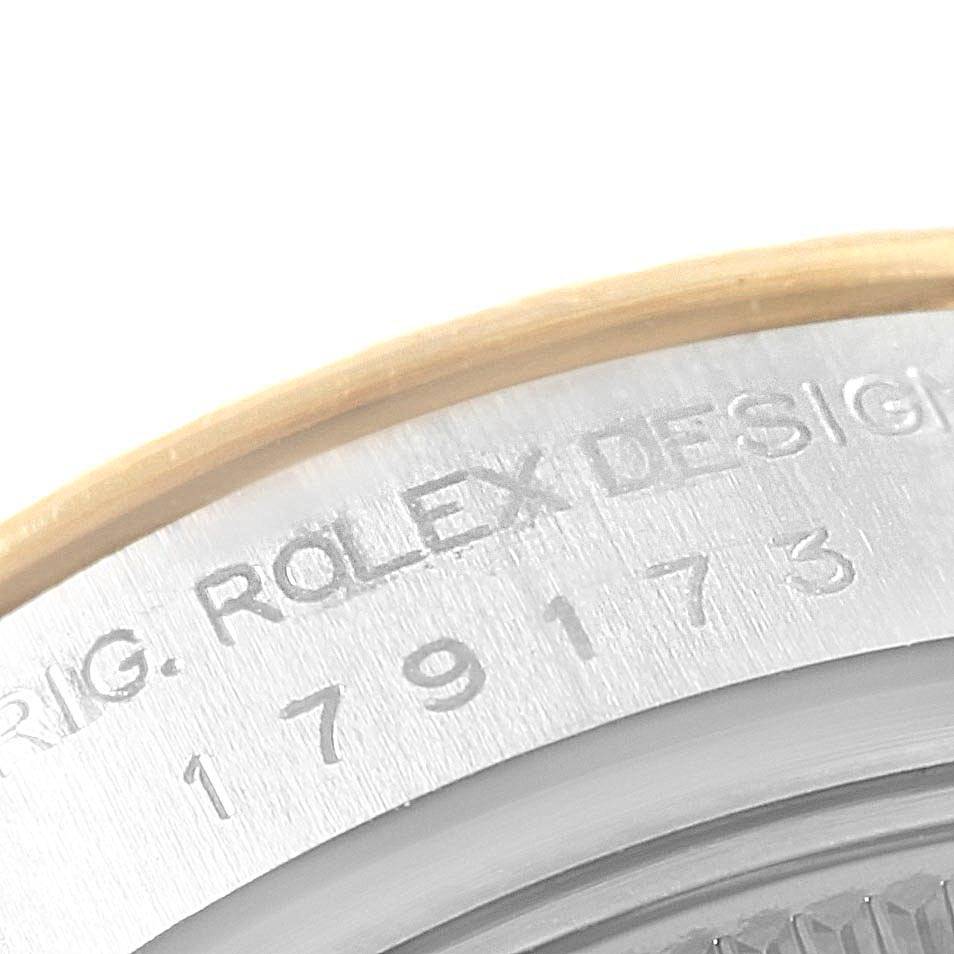 This image shows a close-up view of the case back and model engraving on a Rolex Datejust 179173 Women's Steel and Gold (two tone) Mother of Pearl Dial 179173 Women's Steel and Gold (two tone) Mother of Pearl Dial watch.