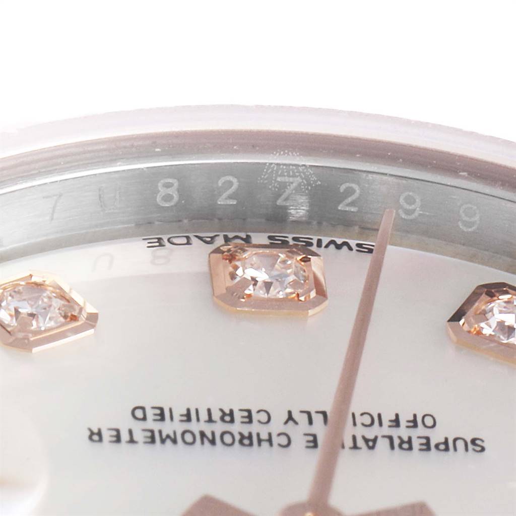 This close-up angle of the Rolex Datejust 279171 Women's Steel and Gold (two tone) Mother of Pearl Dial 279171 Women's Steel and Gold (two tone) Mother of Pearl Dial watch shows the watch face, diamond hour markers, and part of the "Swiss Made" text.