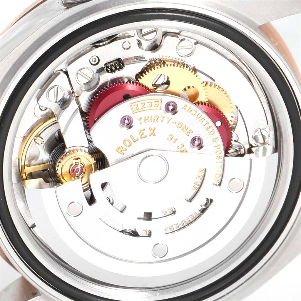 This image shows a close-up of the Rolex Datejust 279381 Women's Steel and Gold (two tone) Brown Dial 279381 Women's Steel and Gold (two tone) Brown Dial's movement and internal gears from the back.