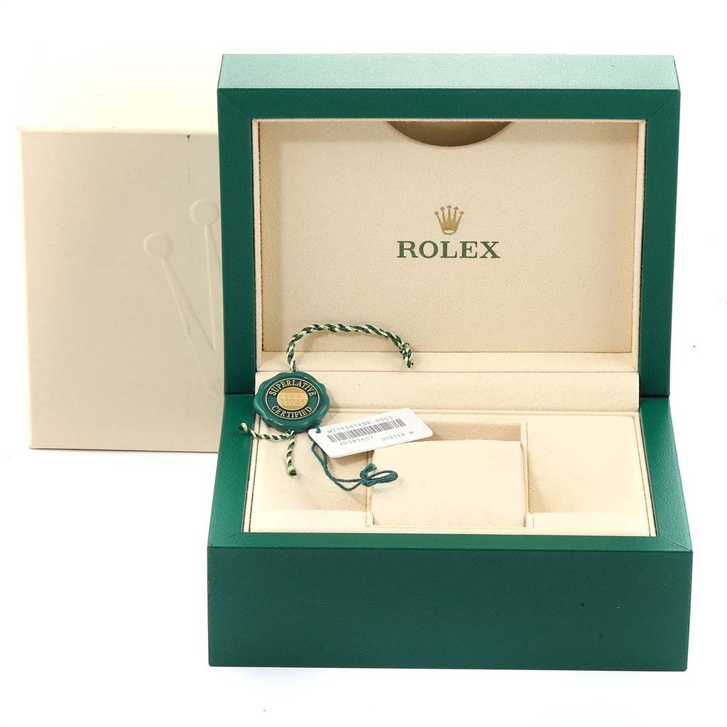 The image shows an open green Rolex box for a Datejust model, with certification tags and an outer white box.