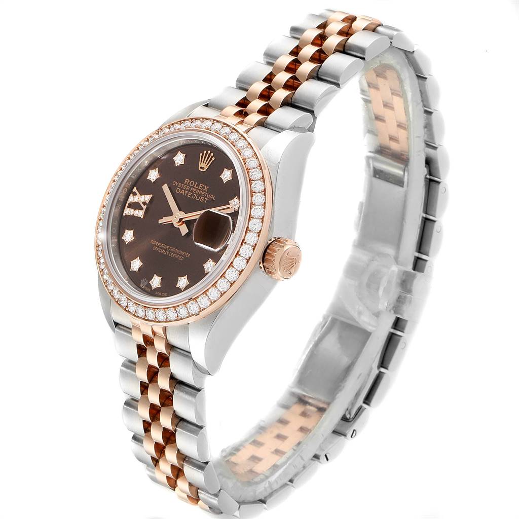 This image shows a Rolex Datejust 279381 Women's Steel and Gold (two tone) Brown Dial 279381 Women's Steel and Gold (two tone) Brown Dial watch from an angled side view, highlighting the face, bezel, crown, and two-tone bracelet.