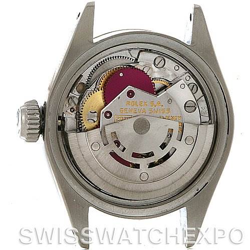 The image shows the back view of a Rolex Datejust 6917 Women's Stainless Steel Silver Dial 6917 Women's Stainless Steel Silver Dial model, revealing its internal movement mechanism.