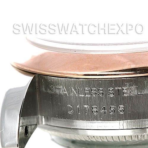 The image shows a close-up of the side of a Rolex Datejust 179161 Women's Steel and Gold (two tone) White Dial 179161 Women's Steel and Gold (two tone) White Dial watch, focusing on the stainless steel case with engraved serial numbers.