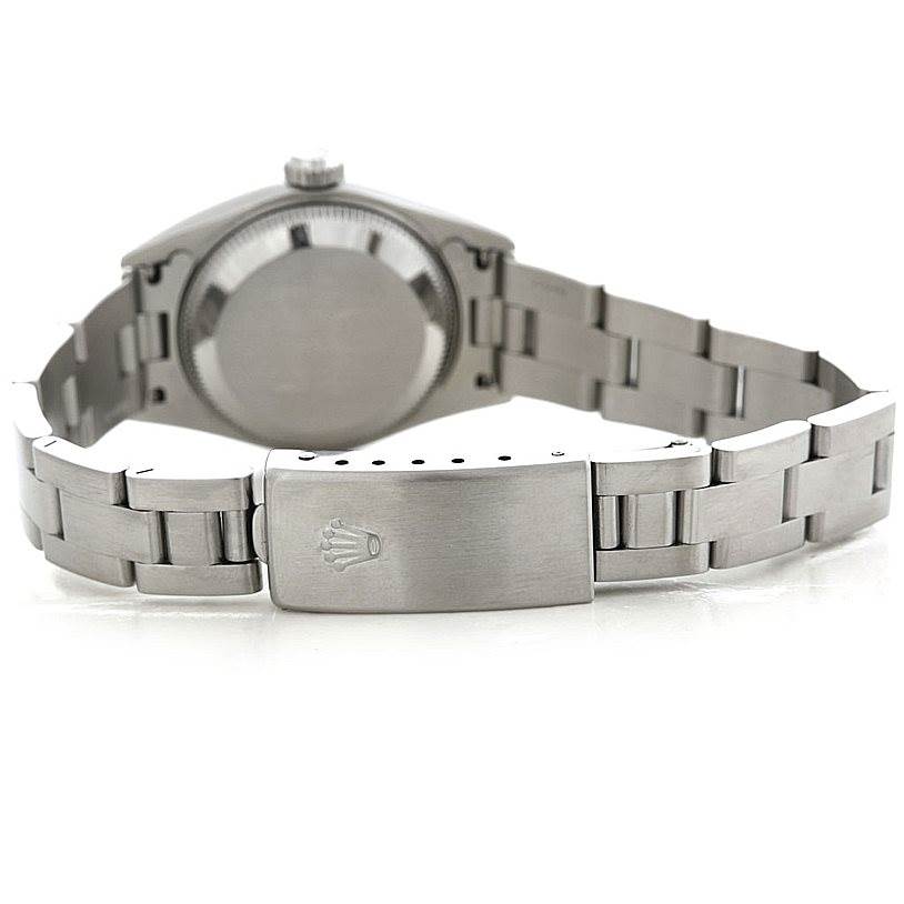 The image shows the back view of a Rolex Datejust 79160 Women's Stainless Steel White Dial 79160 Women's Stainless Steel White Dial watch, highlighting the case back and the clasp of the bracelet.