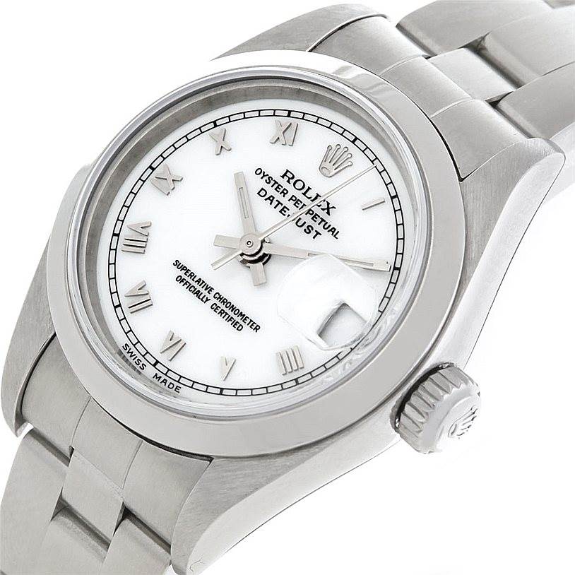 This Rolex Datejust 79160 Women's Stainless Steel White Dial 79160 Women's Stainless Steel White Dial watch is shown at an angle highlighting its face, crown, and part of the metal bracelet.
