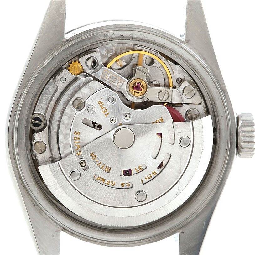 The image shows the internal mechanism and movement of a Rolex Datejust 79160 Women's Stainless Steel White Dial 79160 Women's Stainless Steel White Dial watch with the case back removed.