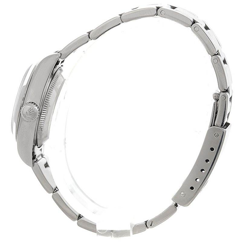 This image shows a side view of the Rolex Datejust 79160 Women's Stainless Steel White Dial 79160 Women's Stainless Steel White Dial watch, highlighting its crown, case, and bracelet.