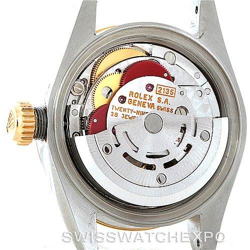 The image shows the rear view of the mechanism of a Rolex Datejust 69173 Women's Stainless Steel Beige Dial 69173 Women's Stainless Steel Beige Dial watch, highlighting the intricate internal components.