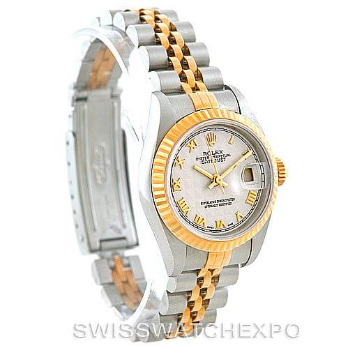 This image shows a Rolex Datejust 69173 Women's Stainless Steel Beige Dial 69173 Women's Stainless Steel Beige Dial watch, angled to display the face, gold fluted bezel, and two-tone bracelet in silver and gold.