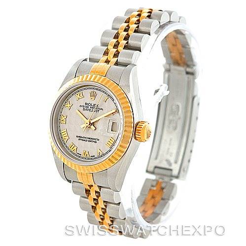 This Rolex Datejust 69173 Women's Stainless Steel Beige Dial 69173 Women's Stainless Steel Beige Dial watch is shown from an angled top-down view, highlighting its face, bezel, crown, and two-tone bracelet.