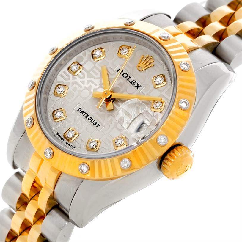 The image shows a close-up of the dial and bezel of a Rolex Datejust 179313 Women's Stainless Steel Beige Dial 179313 Women's Stainless Steel Beige Dial watch, highlighting the gold accents and diamond markers.