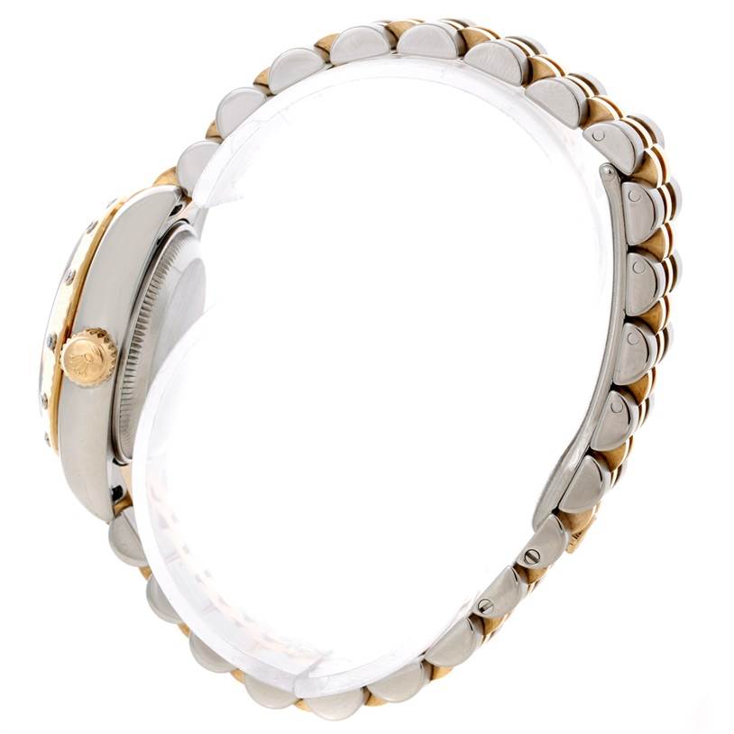 The image shows a Rolex Datejust 179313 Women's Stainless Steel Beige Dial 179313 Women's Stainless Steel Beige Dial watch viewed from the side, showcasing the crown and part of the bracelet.