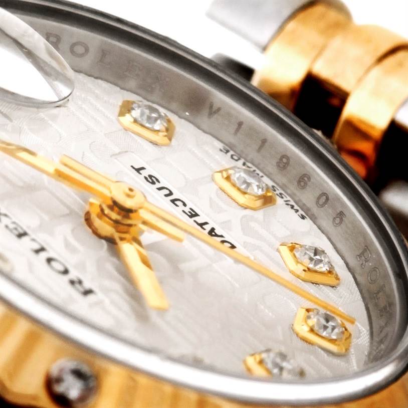 The image shows a close-up of the Rolex Datejust 179313 Women's Stainless Steel Beige Dial 179313 Women's Stainless Steel Beige Dial watch face, highlighting the dial, diamanté markers, and hands.