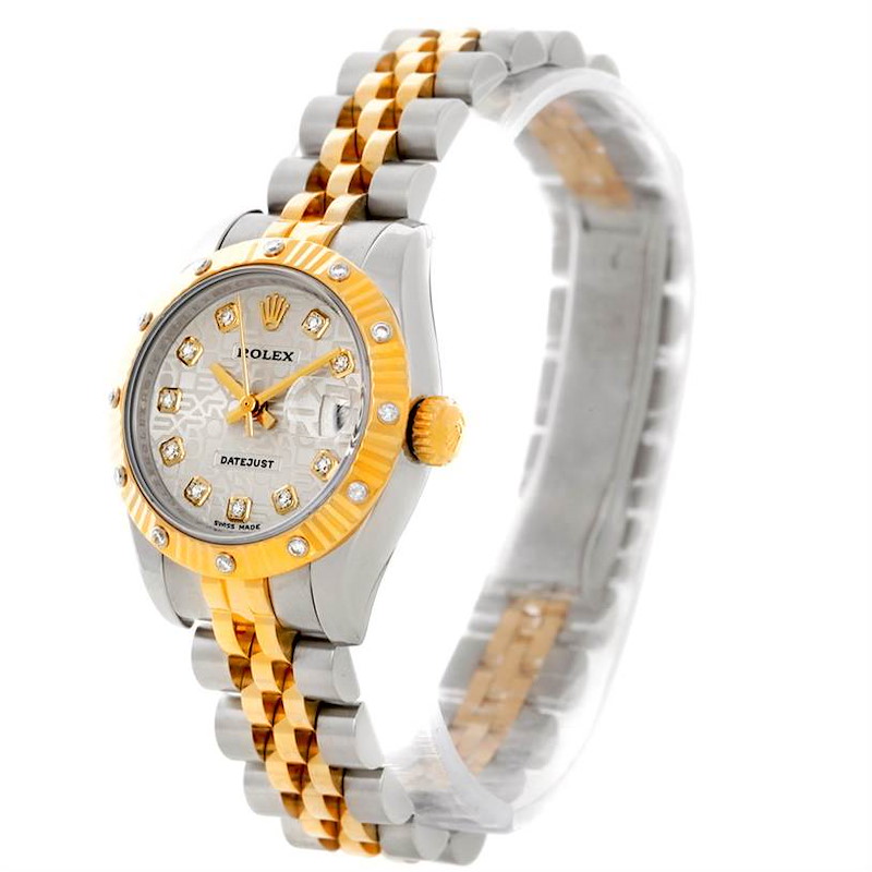The Rolex Datejust 179313 Women's Stainless Steel Beige Dial 179313 Women's Stainless Steel Beige Dial watch is shown at an oblique angle, highlighting its two-tone bracelet, diamond markers, and fluted bezel.