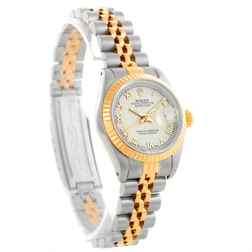 The Rolex Datejust 69173 Women's Stainless Steel Beige Dial 69173 Women's Stainless Steel Beige Dial watch is shown at a three-quarter angle, displaying the face, fluted bezel, and jubilee bracelet in two-tone metal.