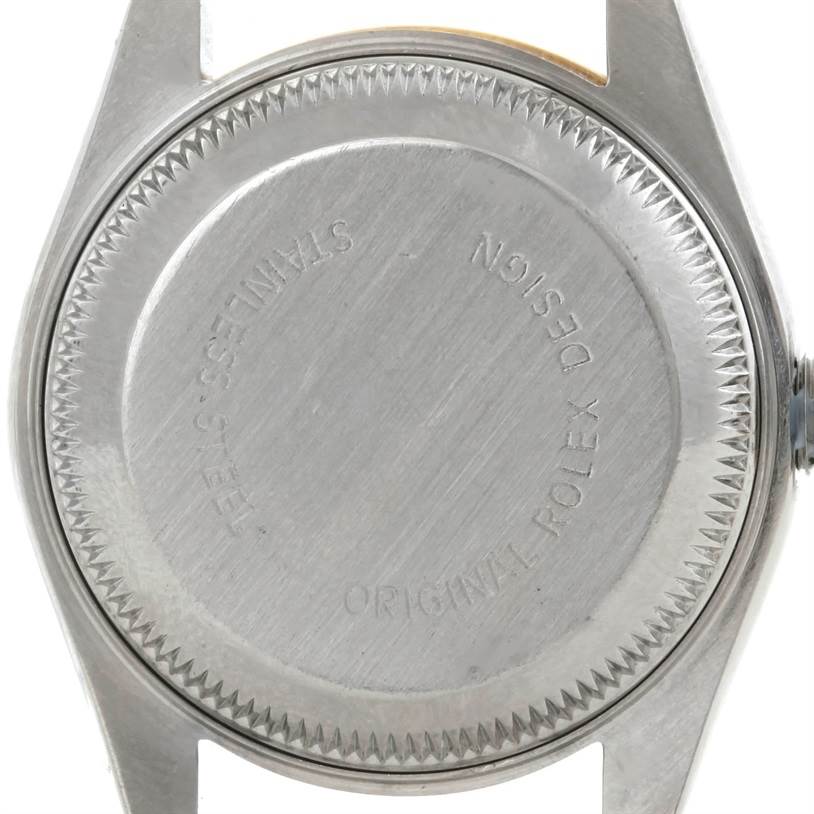 The image shows the back case of a Rolex Datejust 69173 Women's Stainless Steel Beige Dial 69173 Women's Stainless Steel Beige Dial watch from a top-down angle.